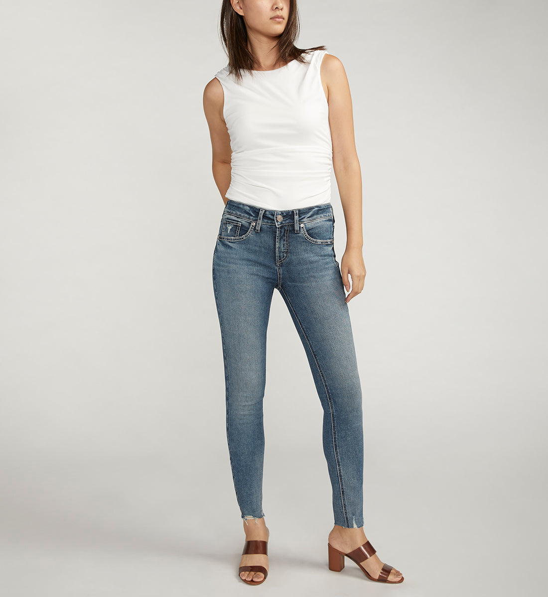 Suki Mid Rise Skinny Jeans